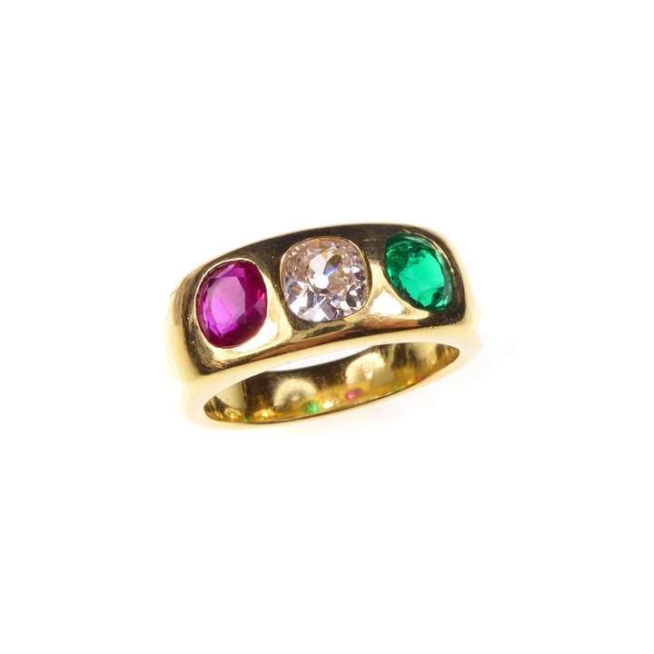 Three stone ruby, diamond and emerald bold gold ring